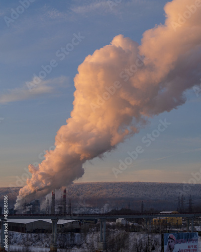 Factory smoke pipe sending smoke to the atmosphere.