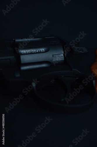 a flobert revolver on the black background photo