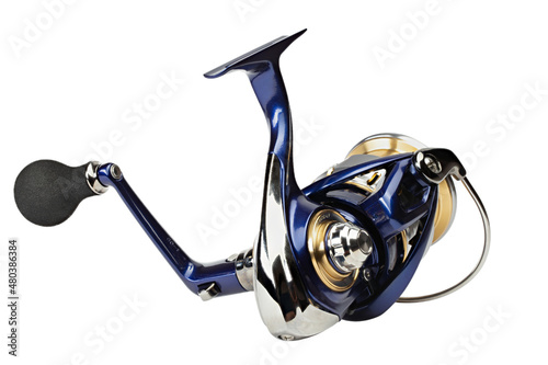 Fishing reel isolated on a white background. Fishing tackle of the premium segment. Spinning reel.