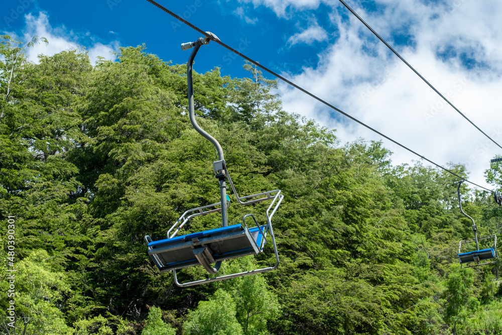 Funicular Cableway Telecabine Chairlifts in the mountains forest travel