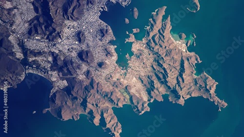 Mexico coast line mountains and city of Guaymas on gulf of California, sunrise animation aerial satellite view from space. Based on image by Nasa photo