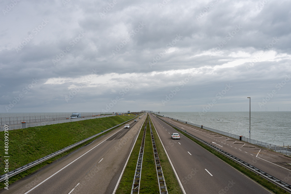 The Afsluitdijk is a major dam and causeway in the Netherlands. It is a fundamental part of the larger Zuiderzee Works, damming off salt water of the North Sea, and turning it into a freshwater lake