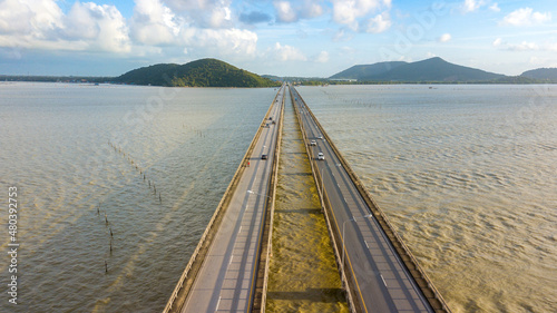 High angle view of concrete bridge across the sea