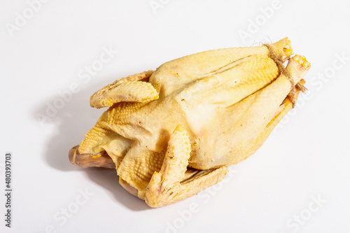 Whole free-range chicken poultry isolated on white background