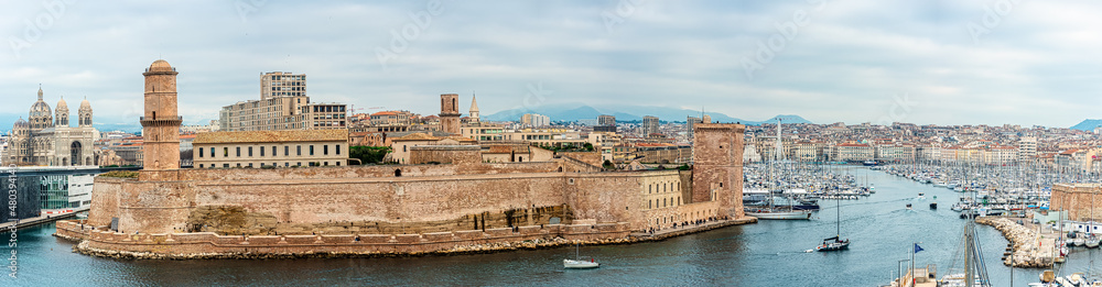 The entrance to the old port (Vieux-Port de Marseille) and Fort Saint Jean in Marseille in Provence, France