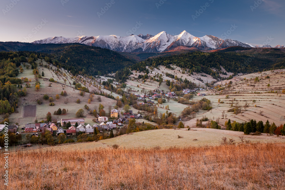 Colorful autumn near the Tatras. Peaks and hills bathed in the light of the setting sun. Colorful autumn near the Tatras. Peaks and hills bathed in the light of the setting sun.