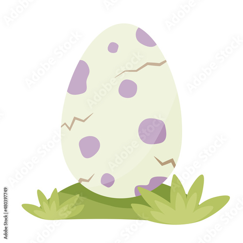 Dinosaur egg on the grass. Little dinosaur birthday. Purple spots.