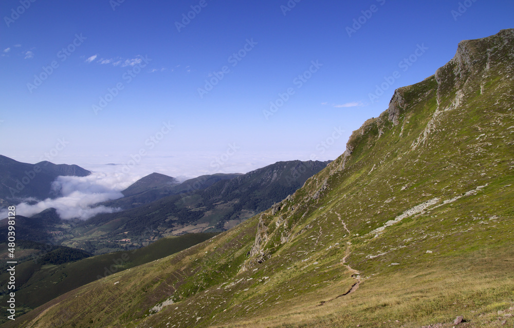 Mountainous part of Cantabria in the north of Spain, hiking route around Alto Campo mountain, summer
