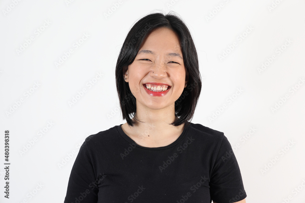 Young attractive south east asian woman pose face expression emotion on white background Young attractive south east asian woman pose face expression emotion on white background