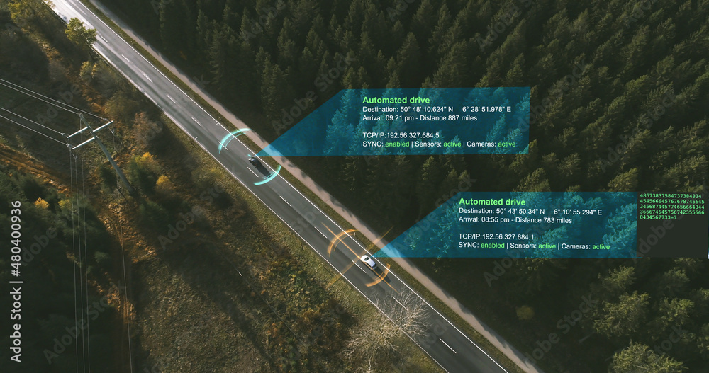 Autonomous Electric car driving on a forest highway with technology assistant tracking information, showing details. Visual effects clip