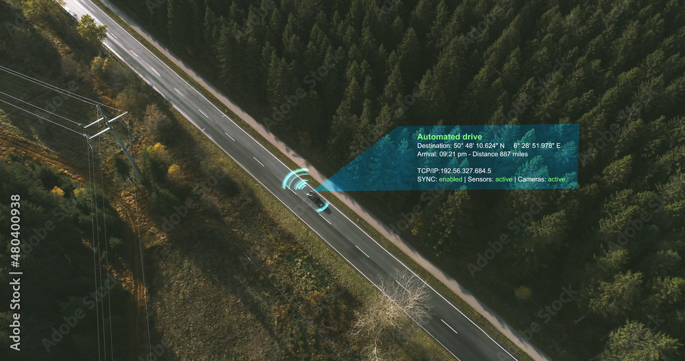 Autonomous Electric car driving on a forest highway with technology assistant tracking information, showing details. Visual effects clip