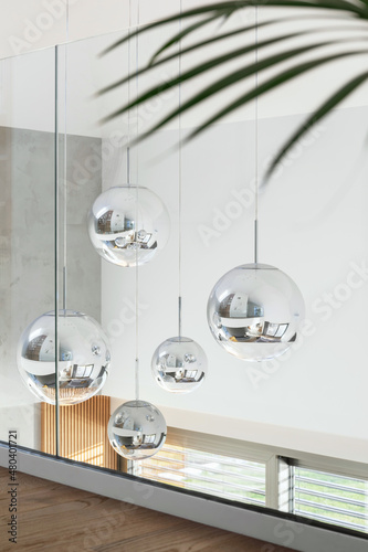 Creartive close up on stylish modern chandelier in minimalistic glamour interior design. Template. photo