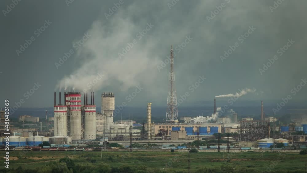 Oil and gas refinery plant with chimney smoke, Business petrochemical industrial, power and fuel energy, Ecosystem and healthy environment concepts, 4k Oil and gas refinery plant with chimney smoke, Business petrochemical industrial, power and fuel energy, Ecosystem and healthy environment concepts, 4k