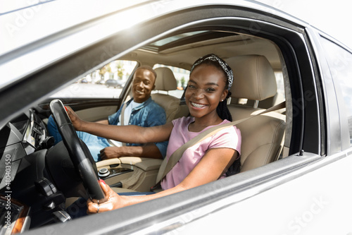 Emotional black family having car ride on weekend © Prostock-studio