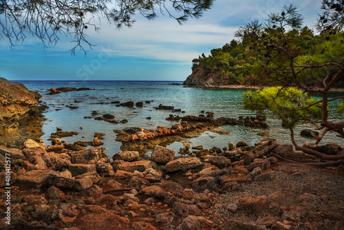 PHASELIS, TURKEY: The scenic view of the beach of Phaselis ancient city on a cloudy day. © Anna ART