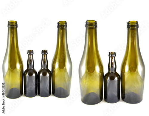 Wine bottle on white background close-up. Glass, vessel, neck, wallpaper, background, texture, alcoholism

