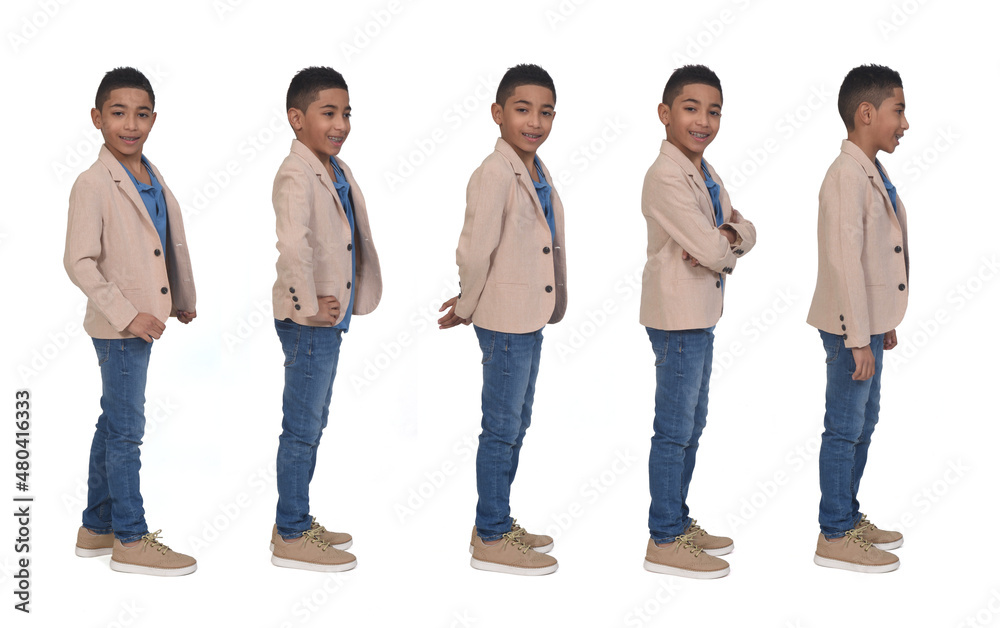 Obraz premium side view of same boy dressed in blazer on white background