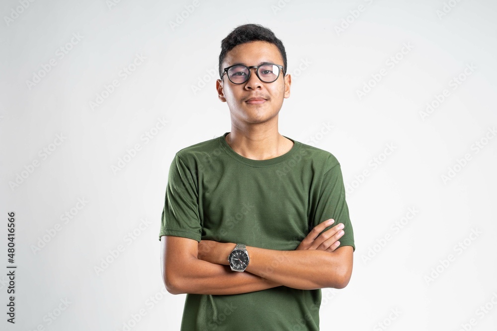 Portrait of handsome cheerful young smiling man in glasses
