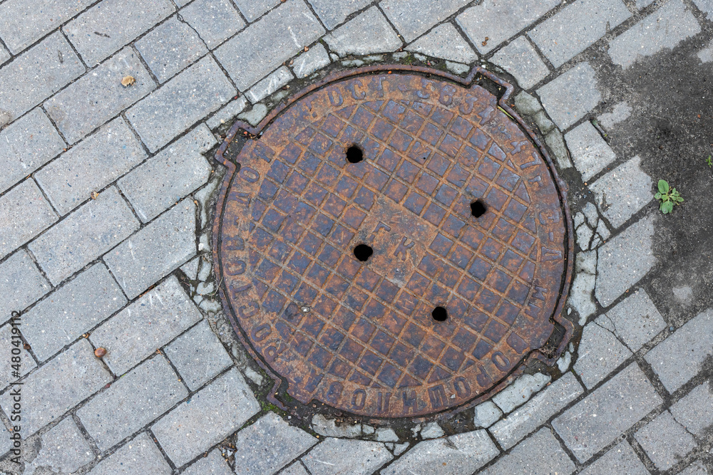 manhole cover in the street