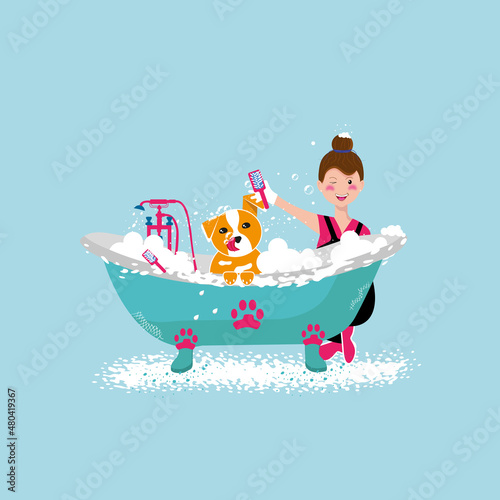 girl bathing a dog in a blue tub