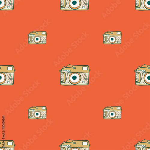 Photo camera vintage seamless pattern. Retro photo cameras design. Repeated texture in doodle style.