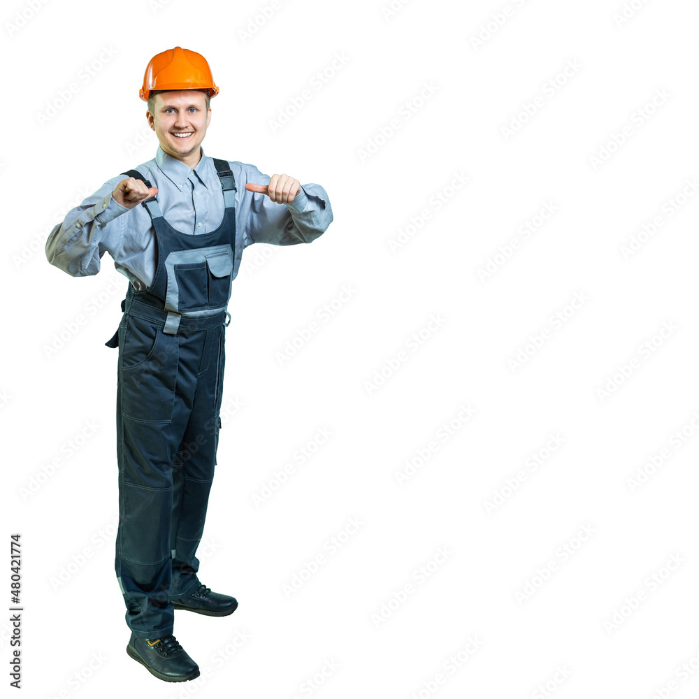 isolated. Engineer, builder points his thumbs at himself. the man smiles broadly. the specialist shows with a gesture that you need to choose it isolated. Engineer, builder points his thumbs at himself. the man smiles broadly. the specialist shows with a gesture that you need to choose it