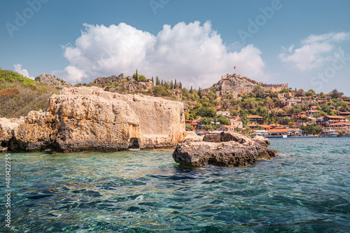 Simena ancient castle on a top of a hill with stunning panoramic view fromthe sea coast. Travel and tourist attractions at Kekova island, Turkey. photo