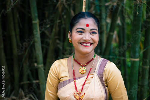 girl smiling face isolated dressed in traditional wearing on festival with blurred background