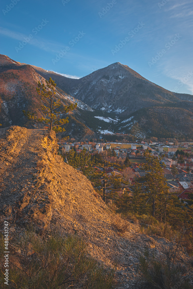 A panoramic vertical landscape view of Veynes, an old town in the French Alps, during the sunset A panoramic vertical landscape view of Veynes, an old town in the French Alps, during the sunset