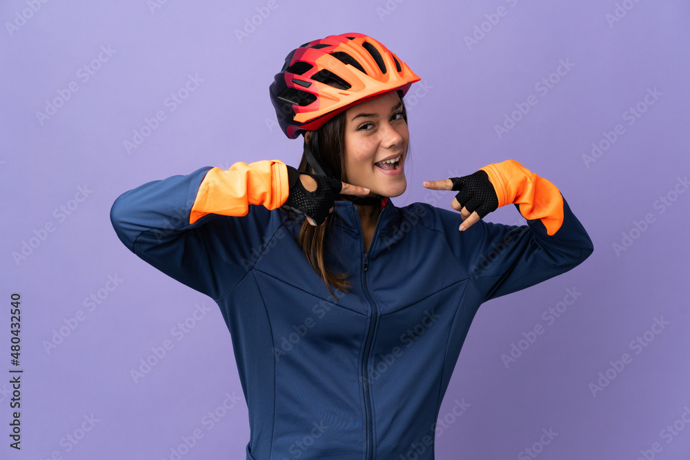 Teenager cyclist girl giving a thumbs up gesture Teenager cyclist girl giving a thumbs up gesture