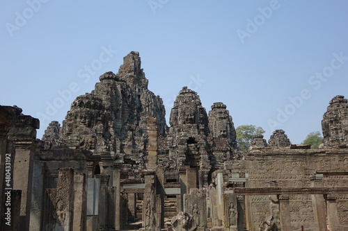 Adventure of exploring mystic Bayon temple in the impressive Khmer ruin city Angkor Thom (horizontal image), Siem Reap, Cambodia