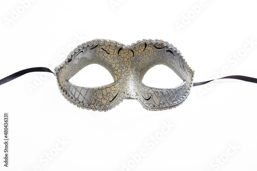 Carnival mask silver color ornate isolated on a white background.