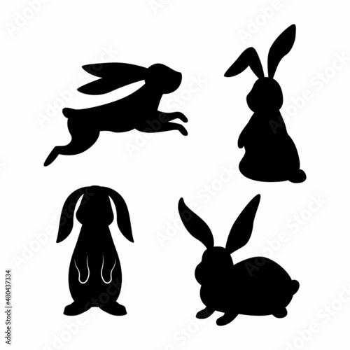 Bunny vector black set. Silhouettes of rabbits in different poses. Vector isolated images on white background.