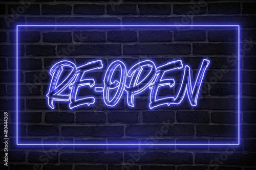open neon sign. blue glow. neon text. Brick wall lit by neon lamps. Night lighting on the wall. Trendy Design. light banner, bright advertisement