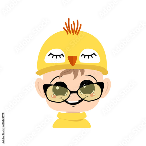 Boy with big eyes and wide happy smile in cute yellow chicken hat with glasses. Head of child with joyful face for holiday Easter, New Year or costume for party. Vector flat illustration