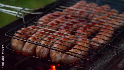 Sausages on the barbecue grill photo