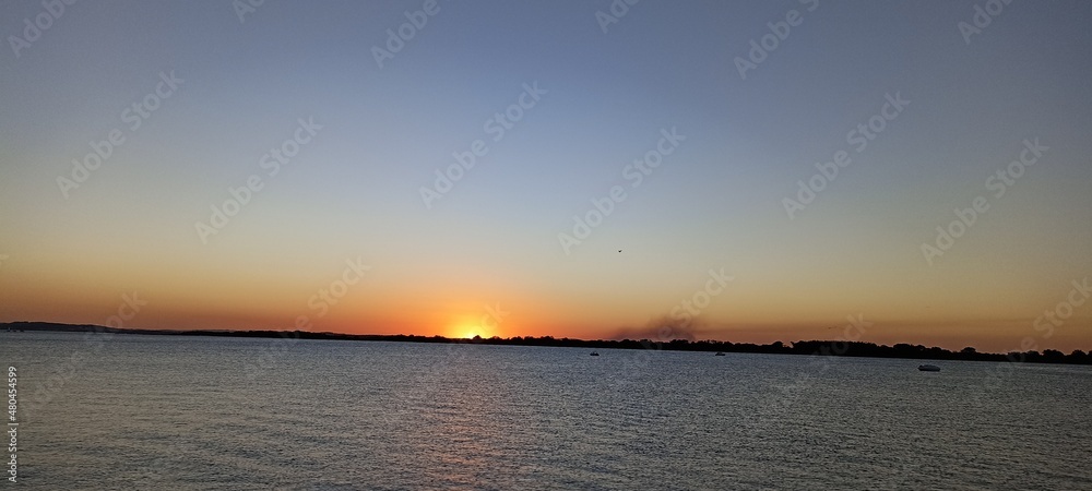 Fototapeta premium sunset over the river