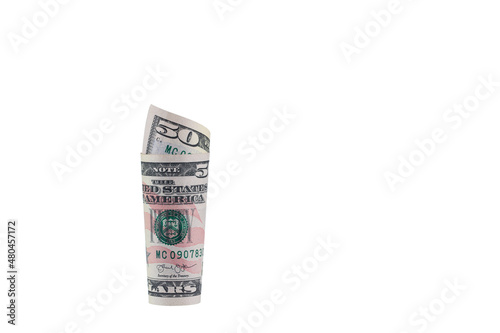 Banknotes of the United States dollar.
Roll of fifty US dollars isolated on a white background. photo