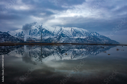 Mining operation near the Oquirrh Mountain Range of Northern Utah by the Great Salt Lake during winter.