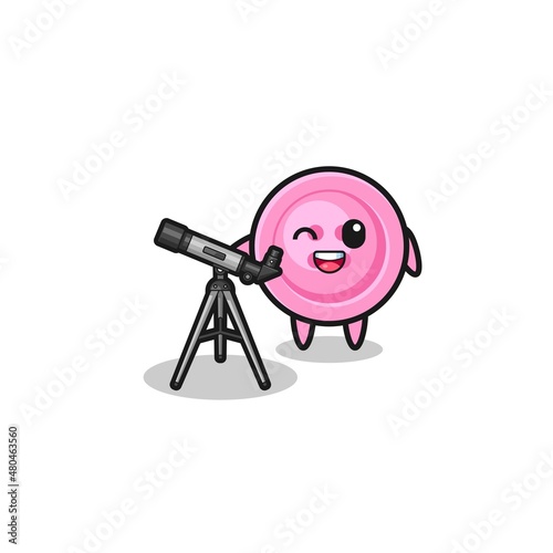 clothing button astronomer mascot with a modern telescope