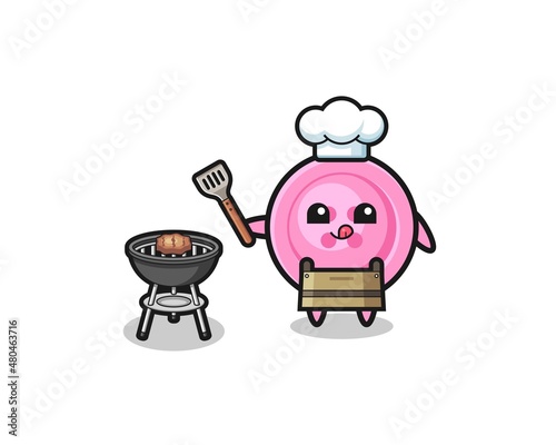 clothing button barbeque chef with a grill