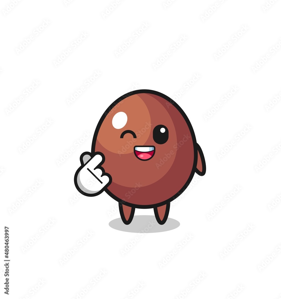 chocolate egg character doing Korean finger heart chocolate egg character doing Korean finger heart