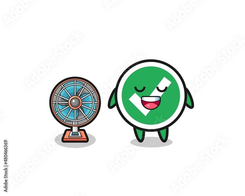 cute check mark is standing in front of the fan