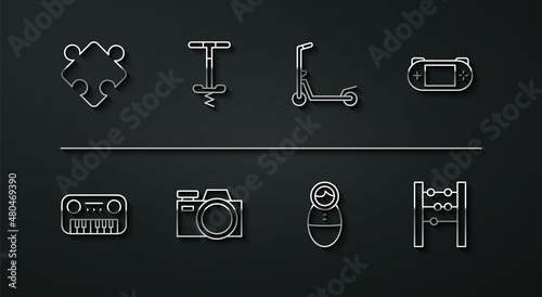 Set line Puzzle pieces toy, Toy piano, Portable video game console, Tumbler doll, Photo camera, Pogo stick jumping, Abacus and Scooter icon. Vector
