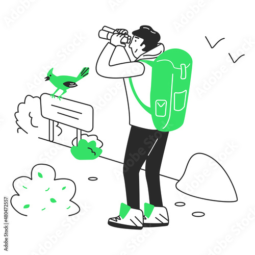 man looking through binoculars at animals