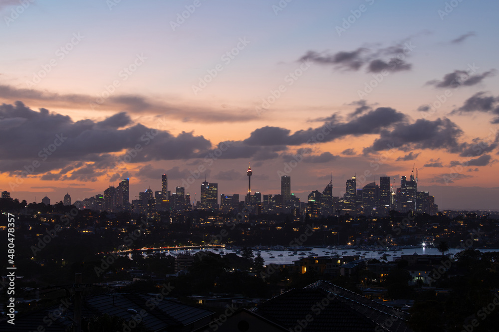 Night view of Sydney skyline with beautiful sky.