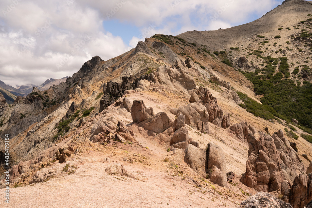 Alpine landscape. View of the rocky mountain peak of Bella Vista hill in Bariloche, Patagonia Argentina. Beautiful rock texture and colors. 