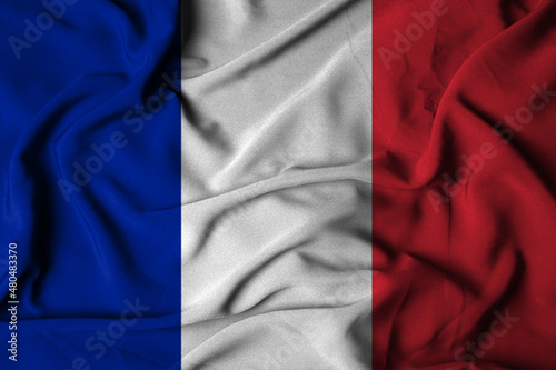selective focus of the france flag, with waving fabric texture. 3d illustration
