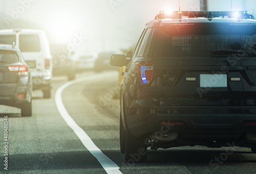 Obraz na plátne Highway Police Patrol Cruiser on Side of a Road