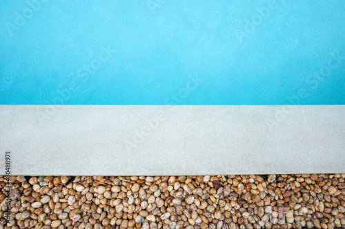 the aerial view of swimming pools decking with blue water